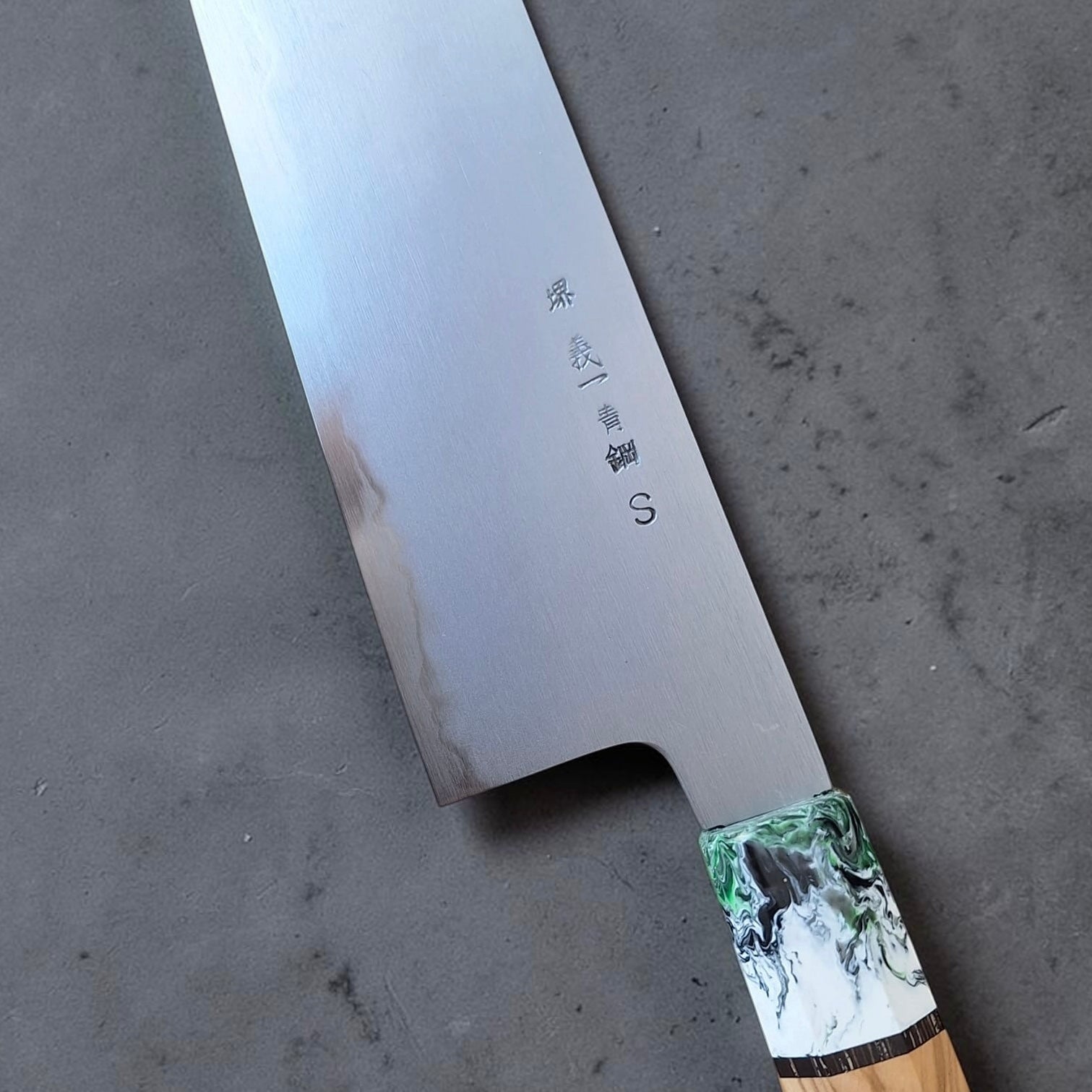Yoshikazu Tanaka Aogami Super Steel Gyuto 255mm with Prisma handle, side profile showing the long gyuto blade shape.