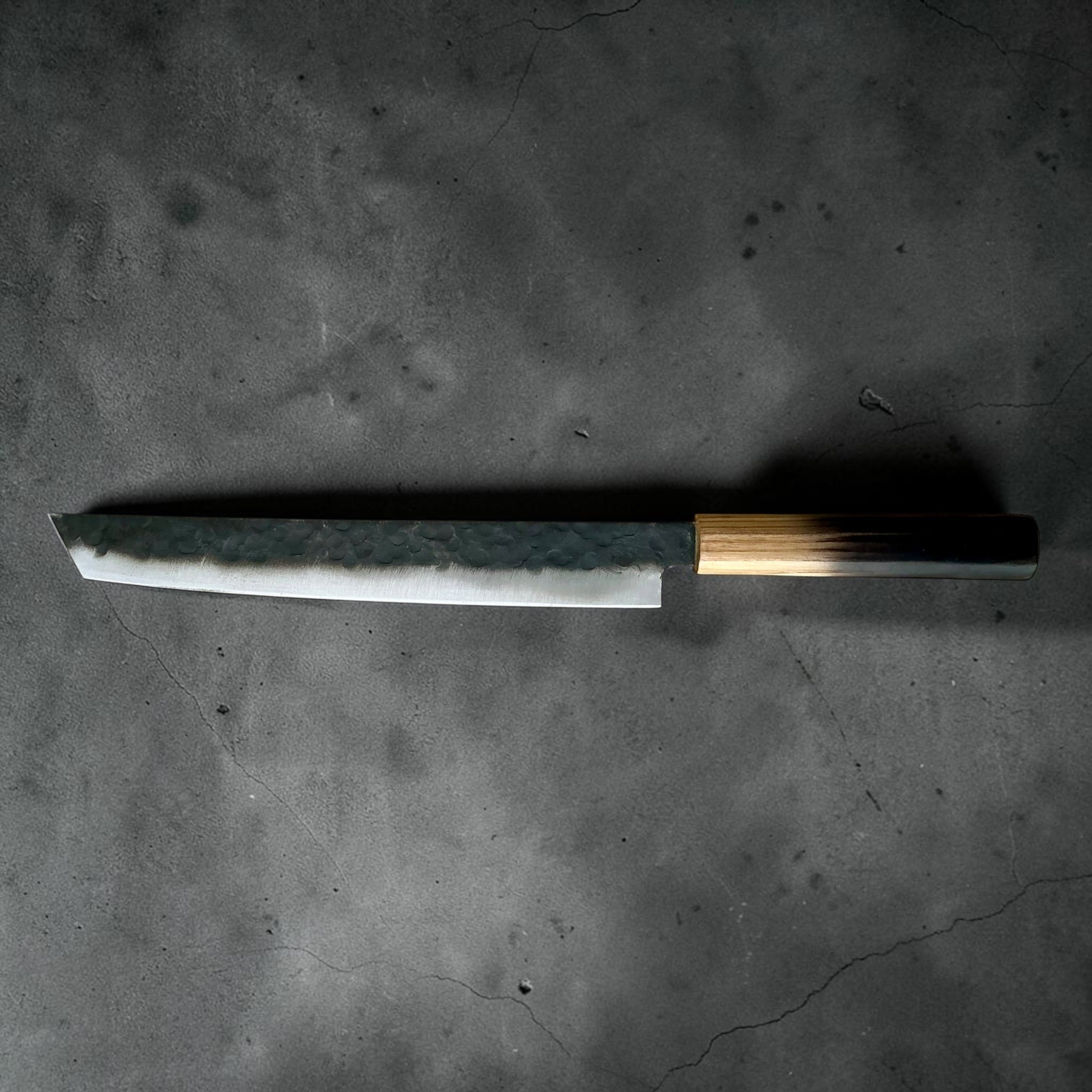 Reverse full profile of Dao Vua V3 Sujihiki 270mm with burnt wood handle