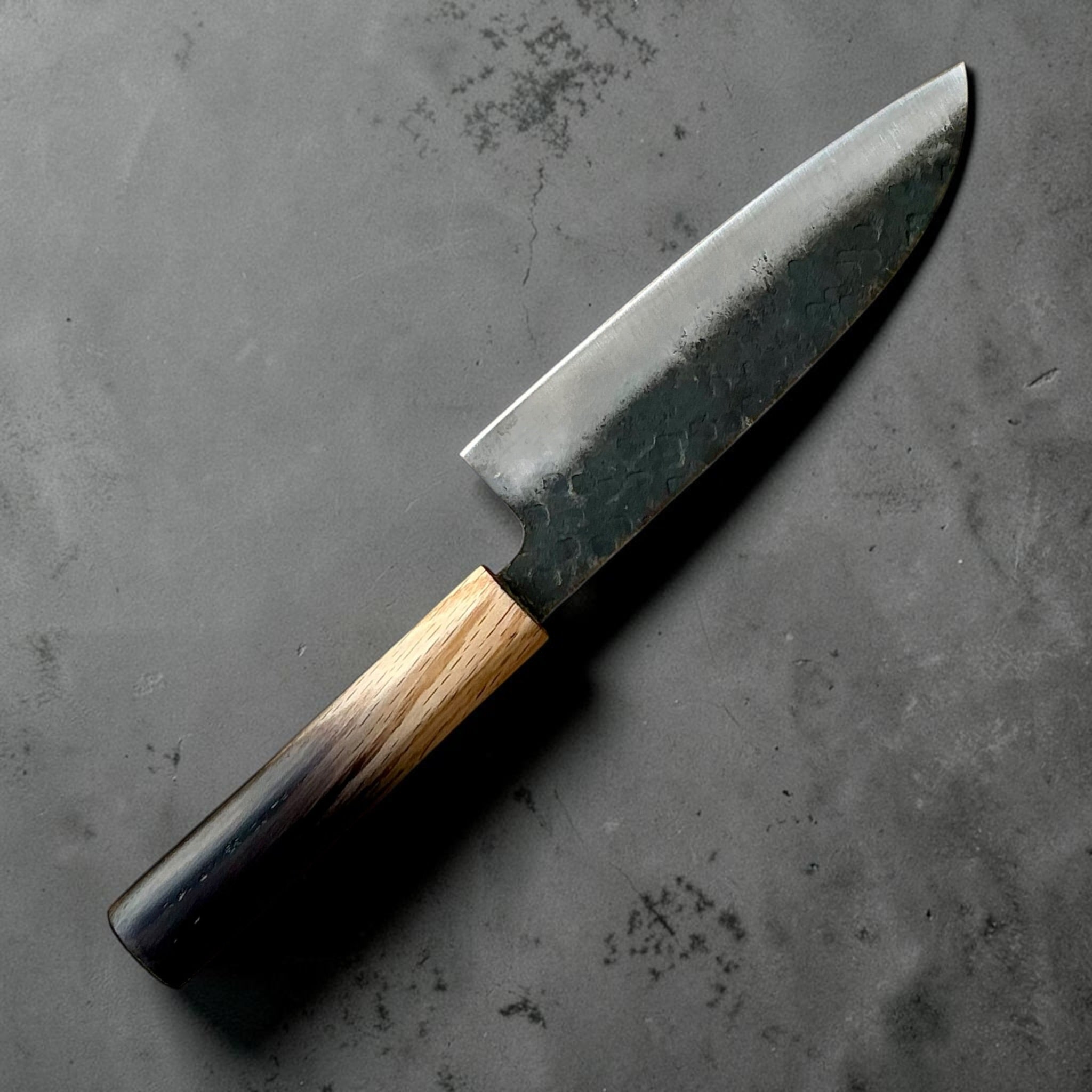 Dao Vua V3 52100 Kuro Tsuchime Santoku with burnt wood handle - reverse blade view