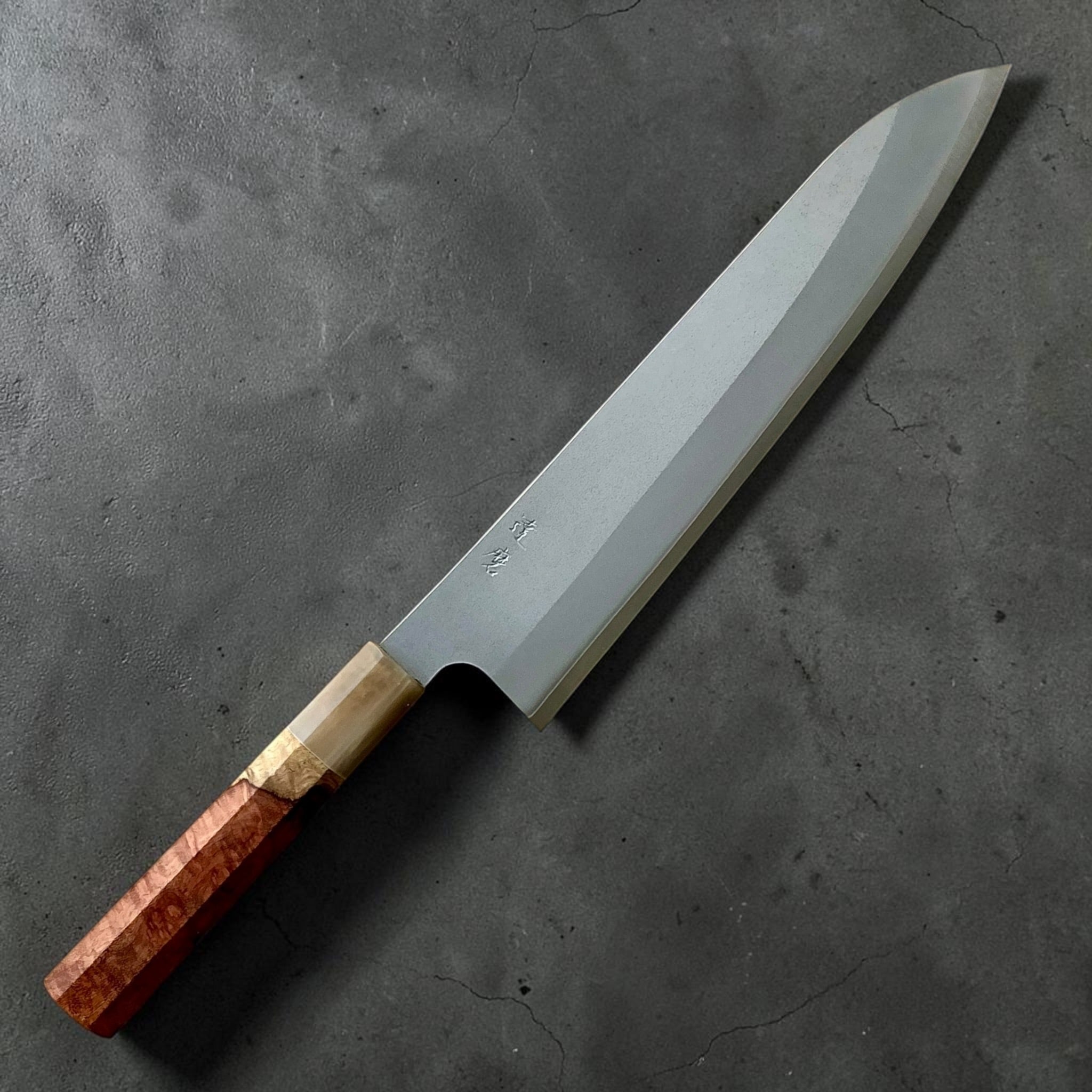 Daruma Hamono Ginsan #3 Migaki Gyuto 240mm with Cypress and Horn handle, hero angle.