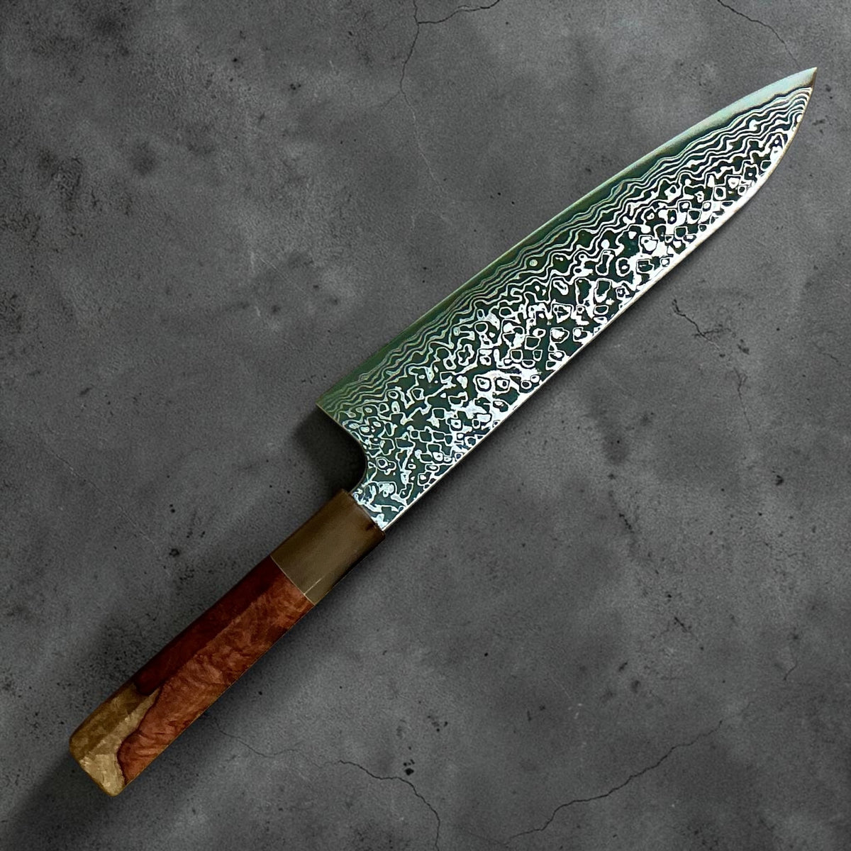 Hatsukokoro Ginga ATS-34 nickel Damascus gyuto 210 mm — amboyna and buffalo horn handle, angle view