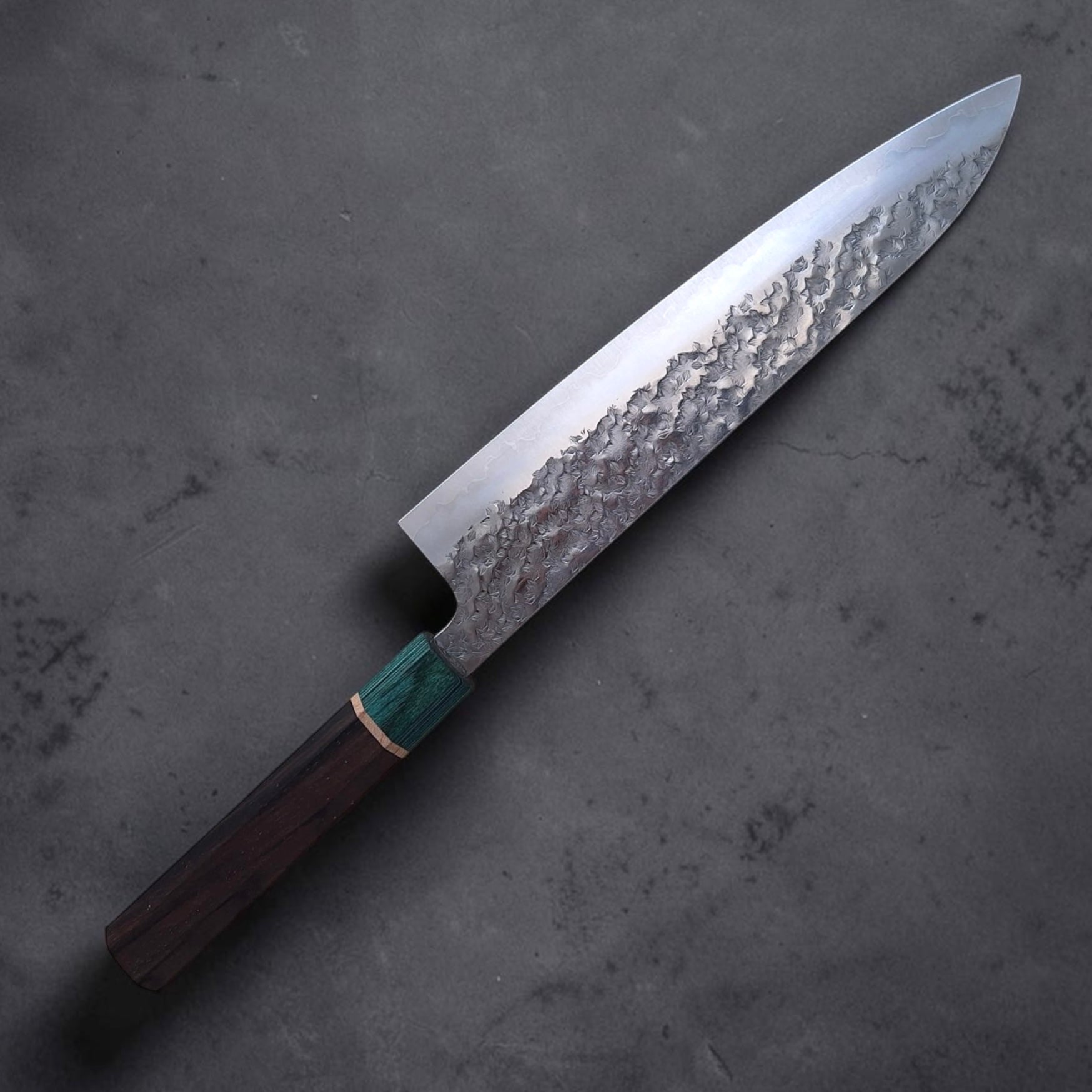 Reverse side and hammered finish of Makoto Kurosaki SG-STRIX 240mm gyuto