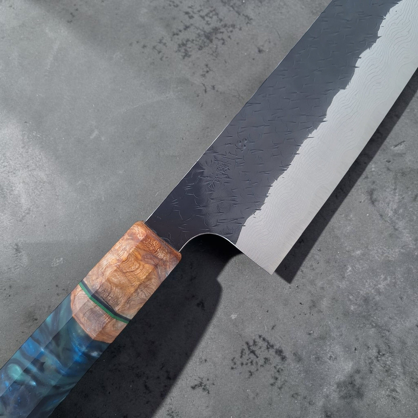 Nigara SG-STRIX Kurouchi Damascus Gyuto 210mm, close-up of kanji, kurouchi finish, Damascus cladding and Prisma handle