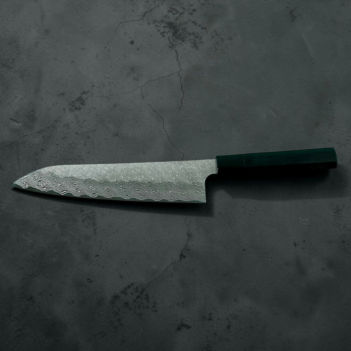 Nigara STRIX Tsuchime Damascus Gyuto 240mm met handvat van massief ebbenhout en hoorn, volledig lemmetprofiel van de andere zijde