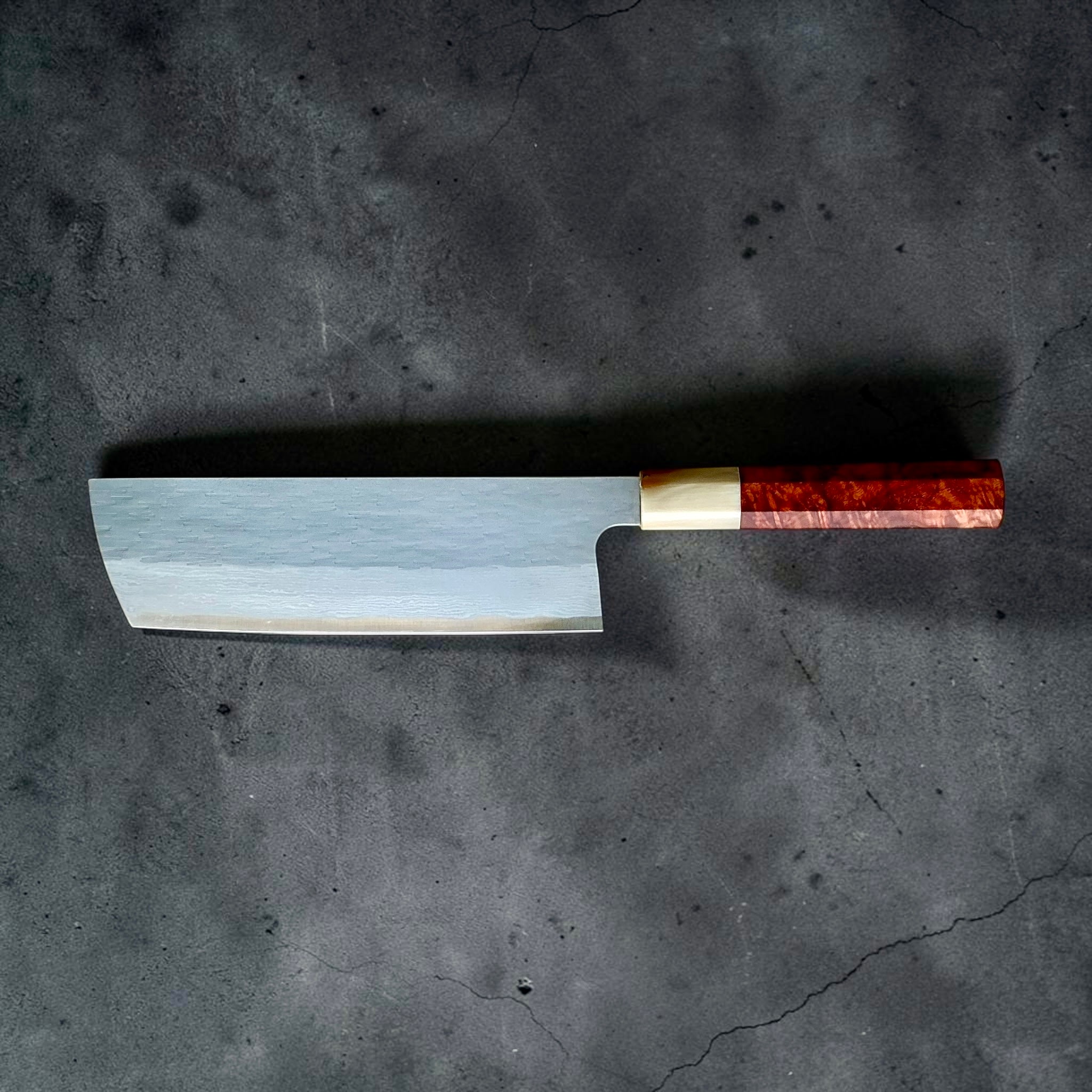 Nigara VG-XEOS polished tsuchime nakiri 165mm, reverse full profile with Amboyna burl and buffalo horn handle.