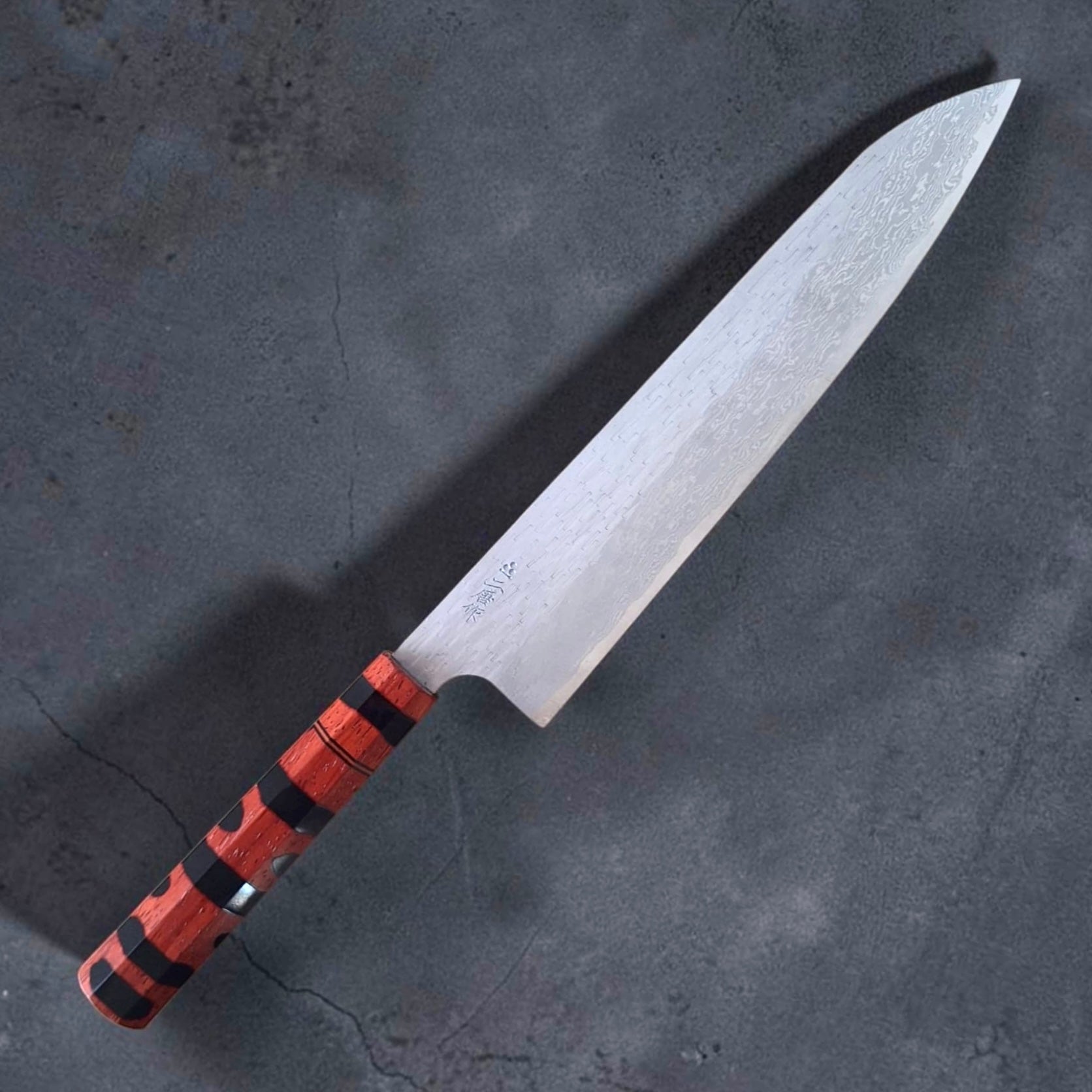 Nigara VG-XEOS Tsuchime Gyuto 240mm with Prisma Knife red and black handle, kanji side hero view