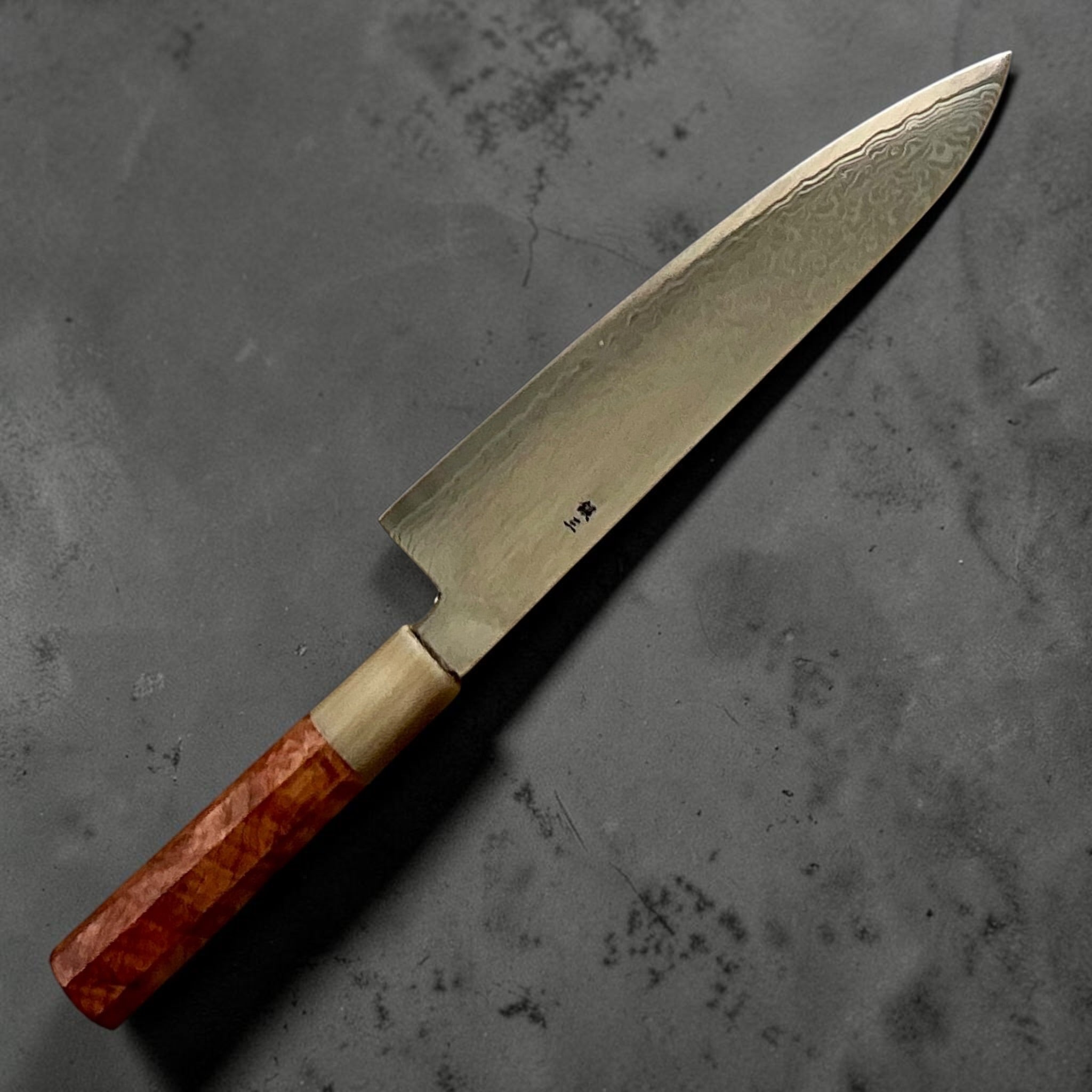 Sakamoto-Ginsan #3 Damascus Gyuto 210mm, angled blade view highlighting the tip and layered finish.