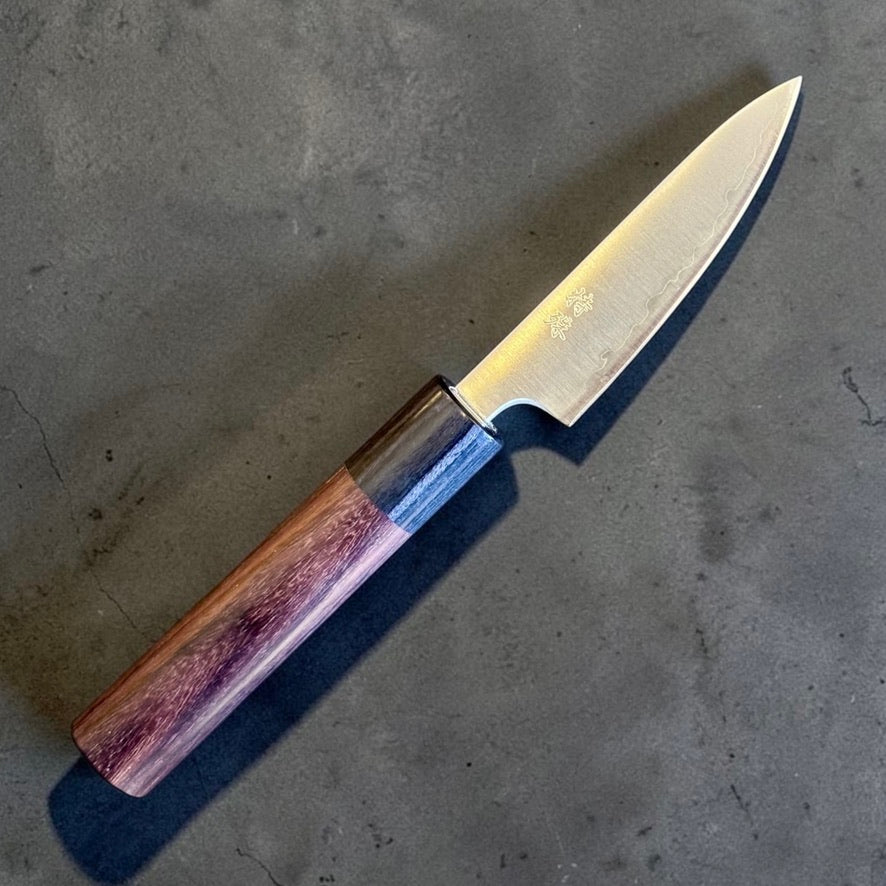 Tokushu Aogami Super Migaki Petty 80mm angled view with rosewood-style wa handle