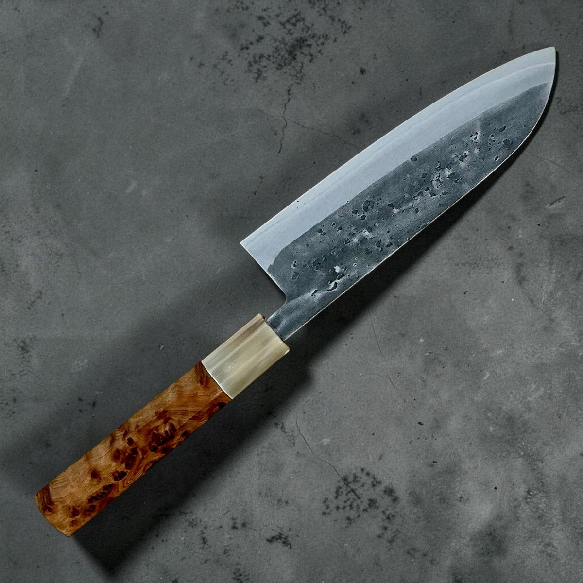 Reverse side of the Tokushu Knife Blue #2 Nashiji Santoku 165 mm with cypress and buffalo horn handle