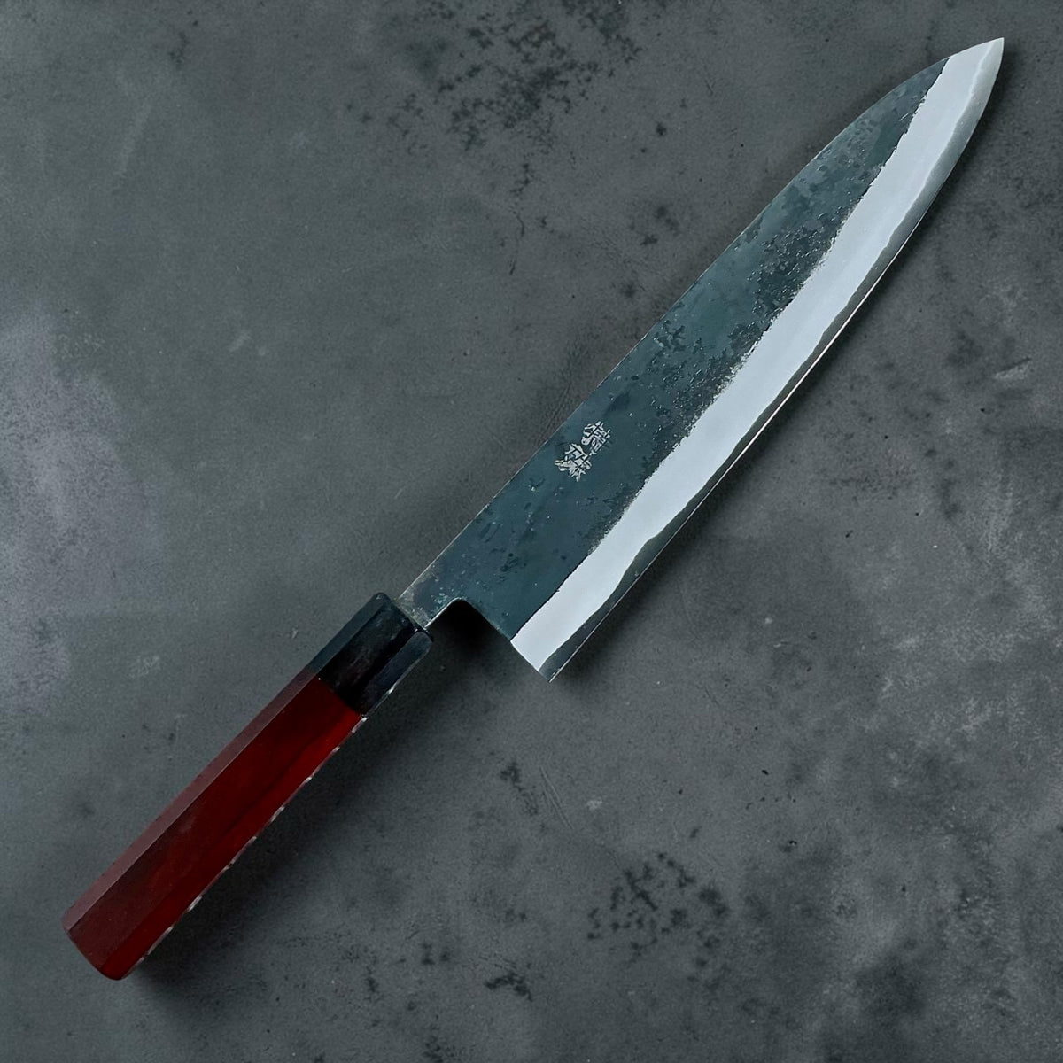 Tokushu Knife White No. 2 iron clad forged finish Gyuto 240 mm, rosewood & ebony, angled front view #handle_rosewood & ebony