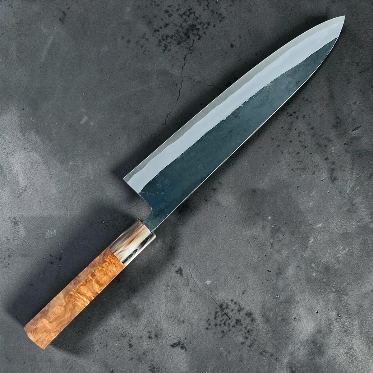 Tokushu Knife White No. 2 iron clad forged finish Gyuto 240 mm, full amboyna & horn, angled reverse view #handle_full amboyna & horn