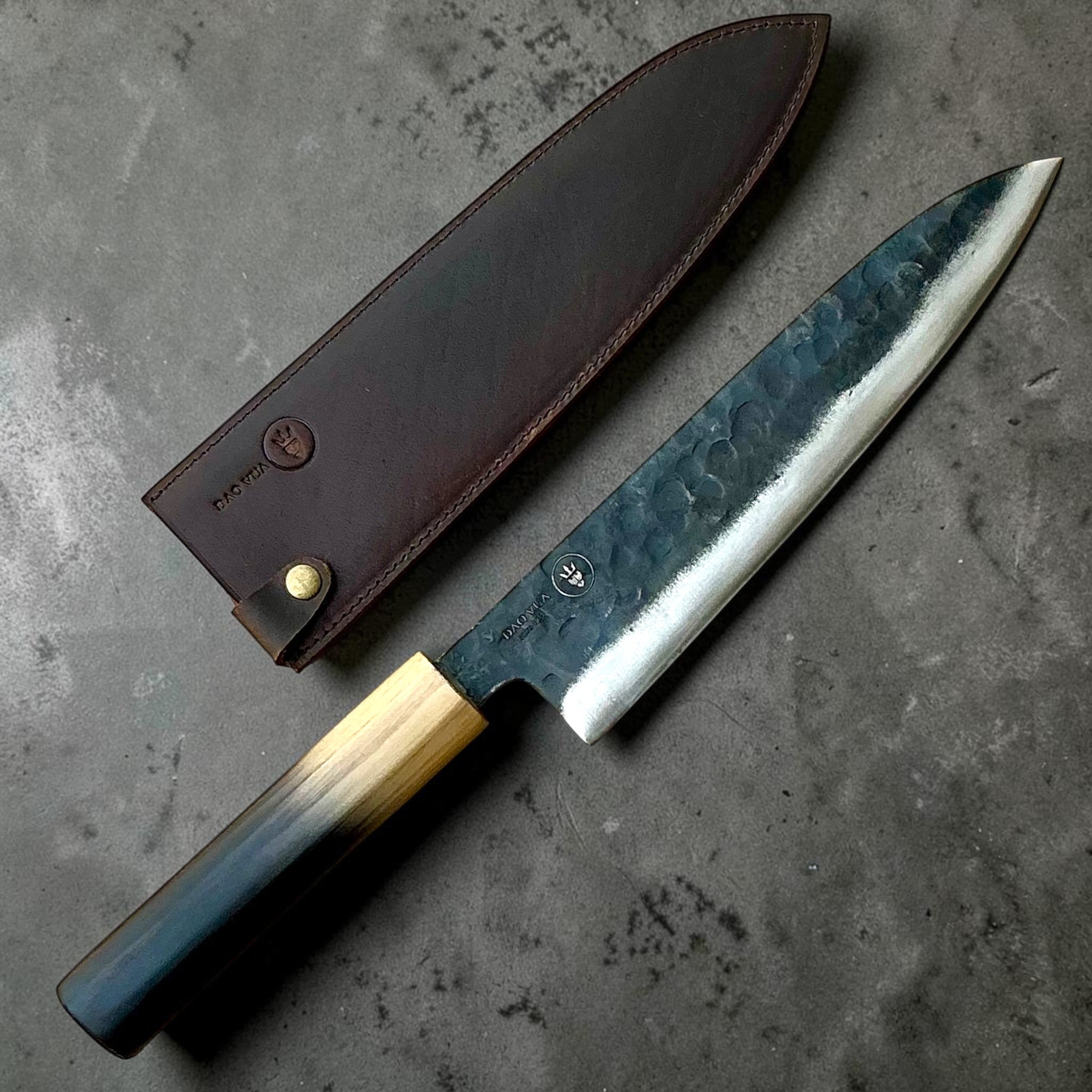 Dao Vua V3 52100 Kuro Tsuchime Gyuto 210mm with burnt wood handle and leather sheath