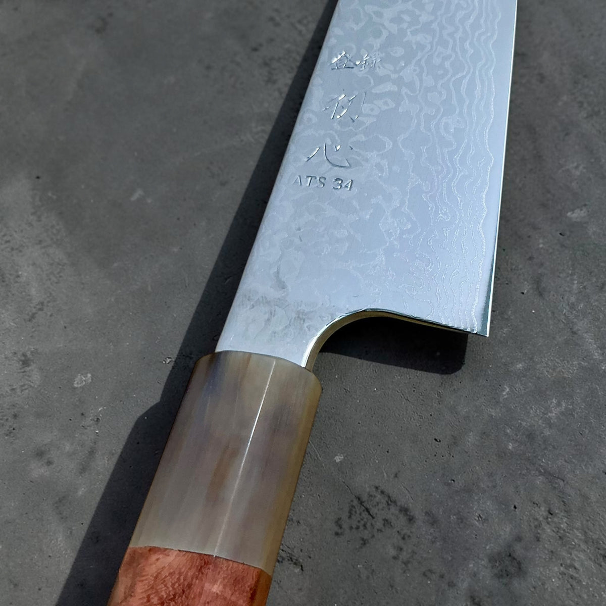 Hatsukokoro Ginga ATS-34 nickel Damascus gyuto 210 mm — amboyna and buffalo horn handle, detail view