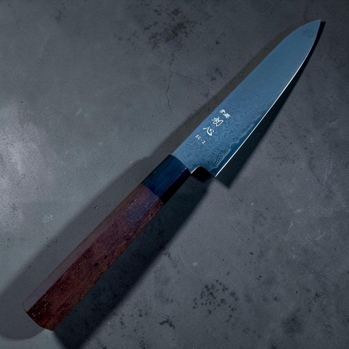 Hatsukokoro Ryuhyo SG2 black Damascus petty 150mm with walnut handle, full knife angled view