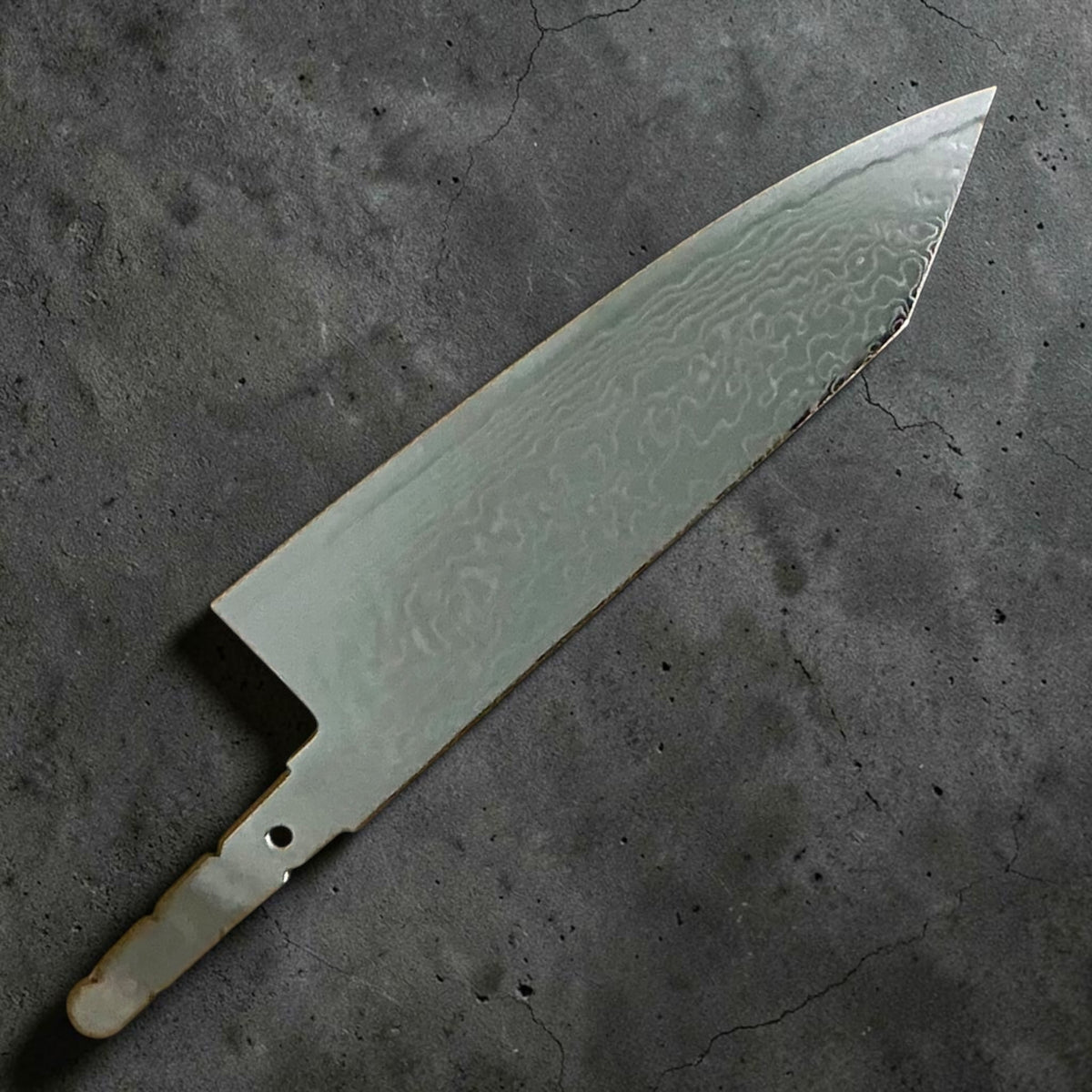 Reverse side of Hatsukokoro Ryuhyo SG2 Migaki Damascus Bunka blade only