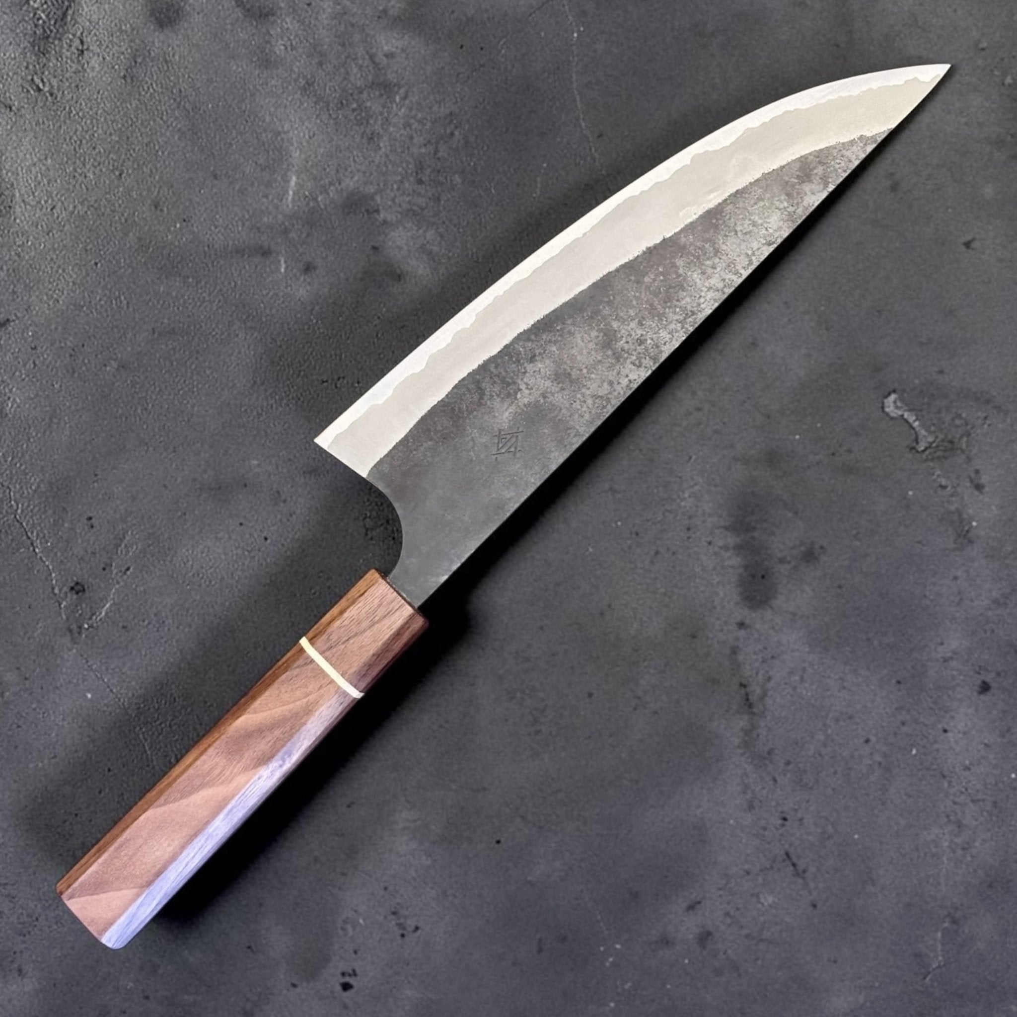 Imai AS Kurouchi USA Gyuto 220 mm with Sanjo walnut handle, angled product photo highlighting kurouchi finish and Sanjo walnut handle.