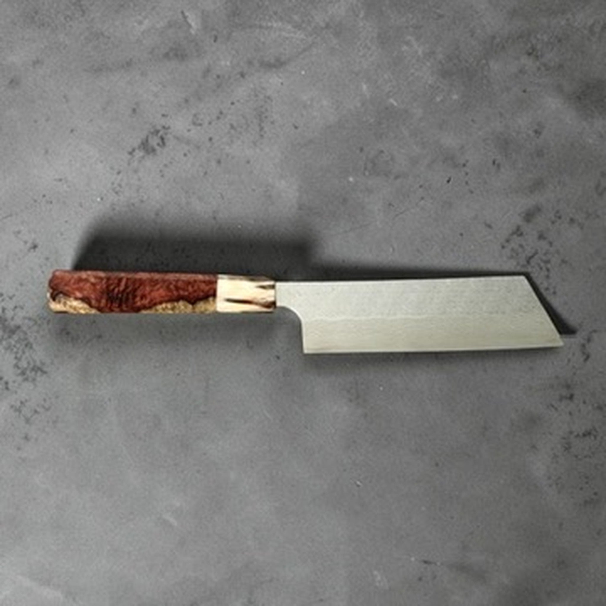 Nigara SG-STRIX Damascus Hakata Kiritsuke Nakiri with Amboyna Burl Handle, right-side profile view showing the blade shape and handle balance.