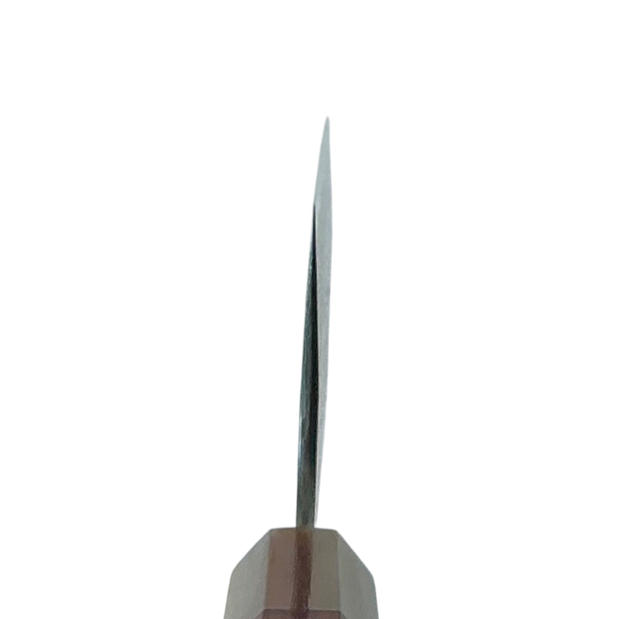 Choil view of Nigara VG-XEOS polished tsuchime nakiri showing thin cutting geometry and buffalo horn ferrule.