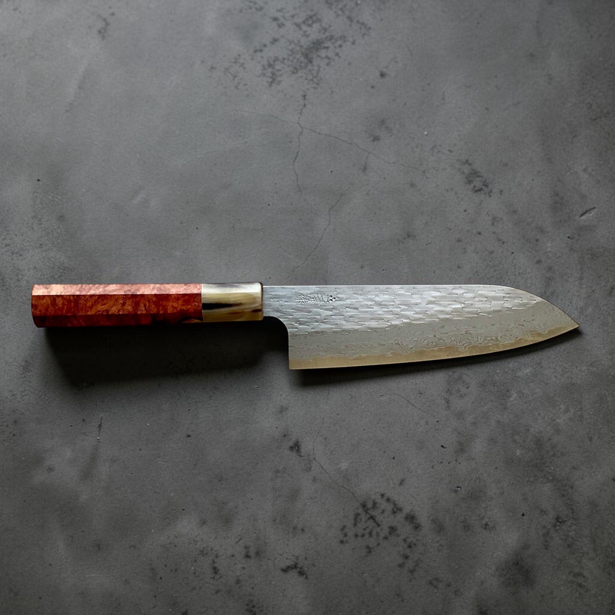 Nigara VG-XEOS polished tsuchime santoku 170mm with red burl and resin custom handle, full side profile.