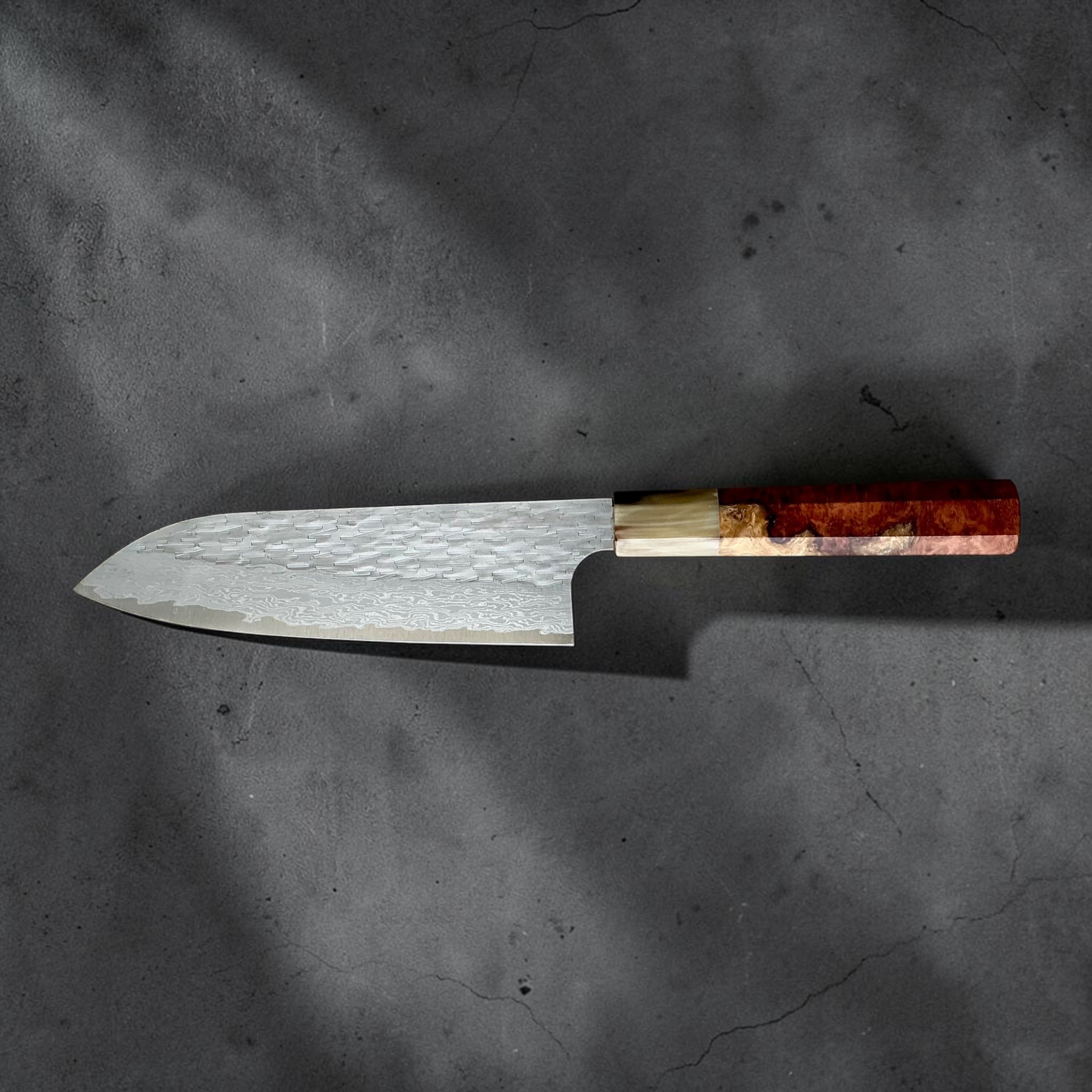 Nigara VG-XEOS polished tsuchime santoku 170mm, reverse full profile with red burl and resin handle.