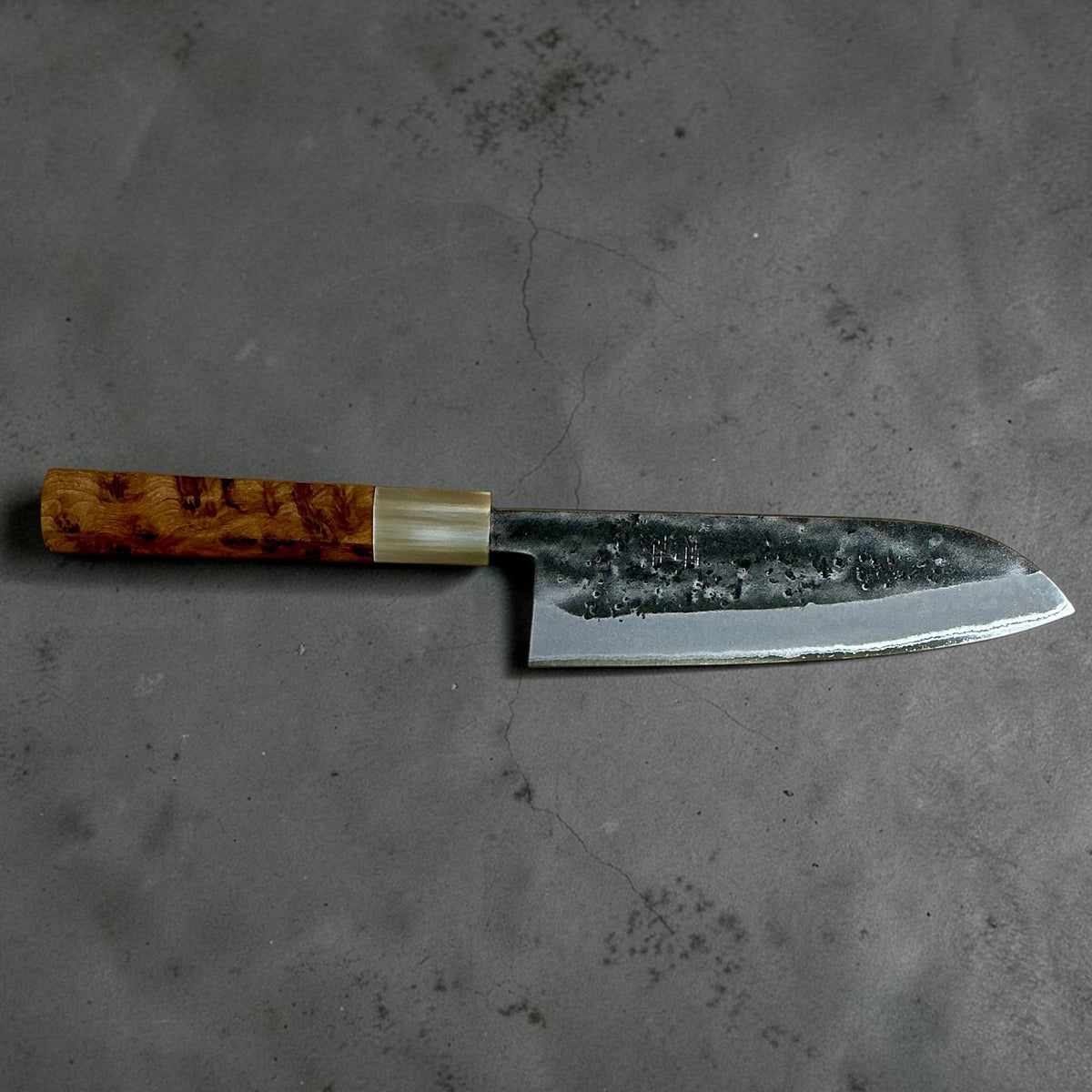 Opposite side profile of the Tokushu Knife Santoku 165 mm with cypress and buffalo horn handle