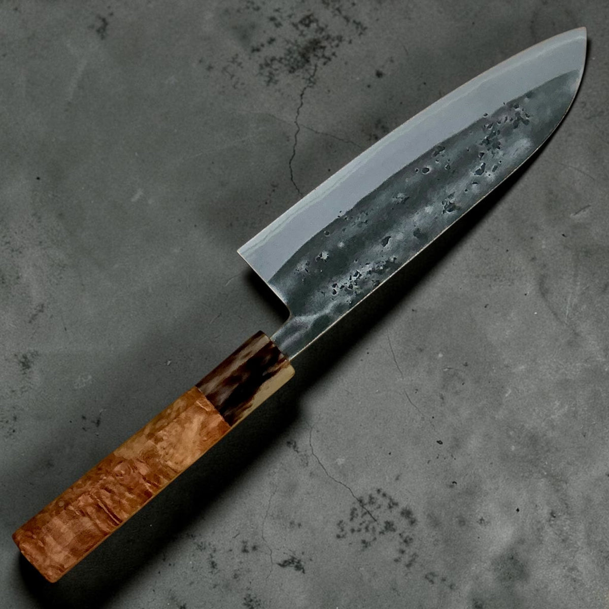 Reverse side of the Tokushu Knife Santoku 165 mm with dark Amboyna and buffalo horn handle