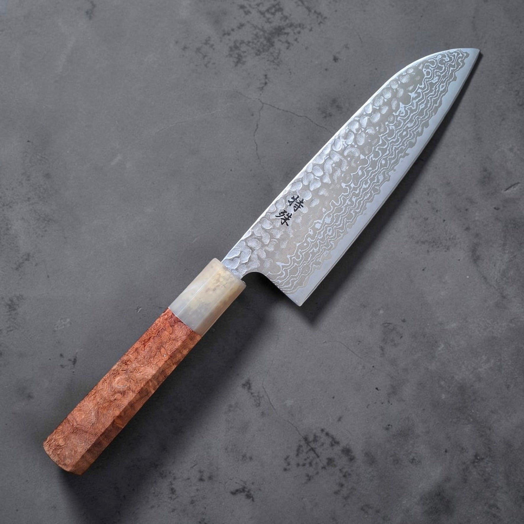 Tokushu Knife Ginsan #3 santoku 165mm showing etched matte tsuchime Damascus finish and amboyna burl handle