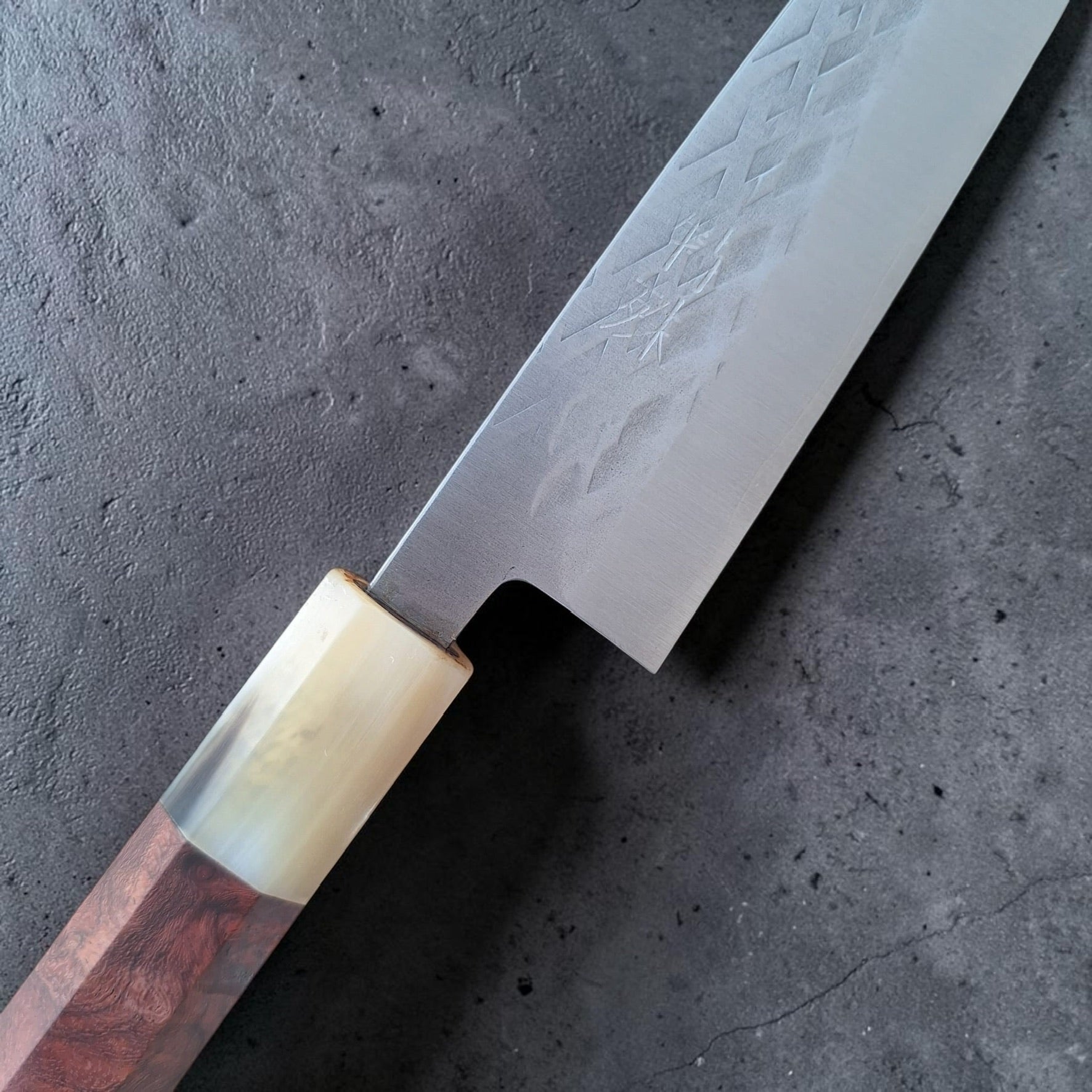 Kanji, hammertone finish and ferrule detail on the Tokushu Knife SLD Hiraki Petty 165mm