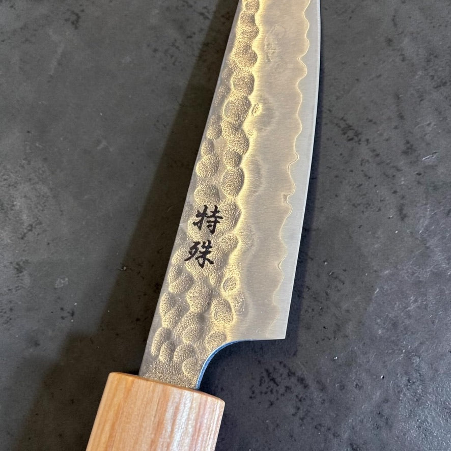 Blade detail showing kanji and hammered finish on Tokushu White #2 Petty 80mm